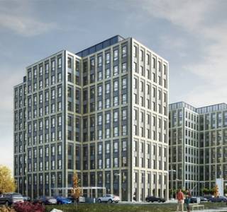 Łódź: Echo Investment wiesza wiechę nad biurowcem Symetris Business Park